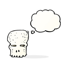 cartoon spooky skull with thought bubble