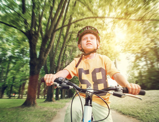 Naklejka premium Boy ride his bicycle