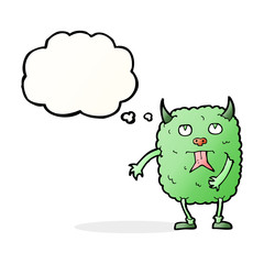 funny cartoon monster with thought bubble
