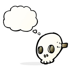 cartoon skull mask with thought bubble