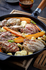 chicken meat and roasted vegetables on cooking pan