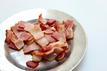 sliced bacon in dish