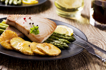 Grilled tuna steak served on asparagus with roasted zmieniakami
