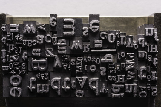 Typographical.
Different metal characters, it used to print documents
