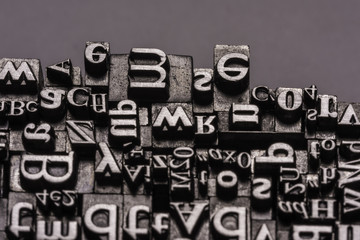 Typographical.
Different metal characters, it used to print documents
