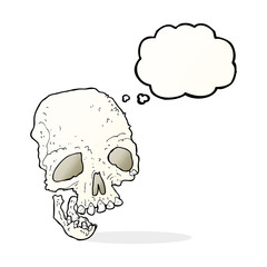 cartoon ancient spooky skull with thought bubble
