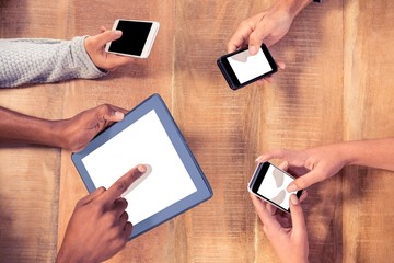 Business people using technologies at desk 