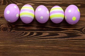 Easter eggs on wooden background
