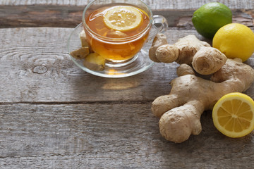 cup of ginger tea on a wooden table