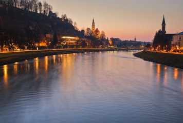 Fototapeta premium Panoramic view of the historic city of Salzburg with Salzach river, blue hour, Salzburger Land, Austria