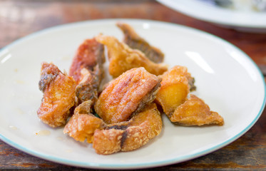 fried fish on plate, selective focus