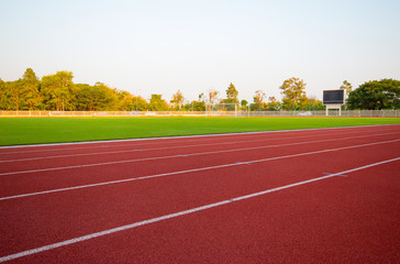 track running, Red treadmill in sport field. soft focus