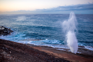 Geyser splashing water on the coast of Tenerife island