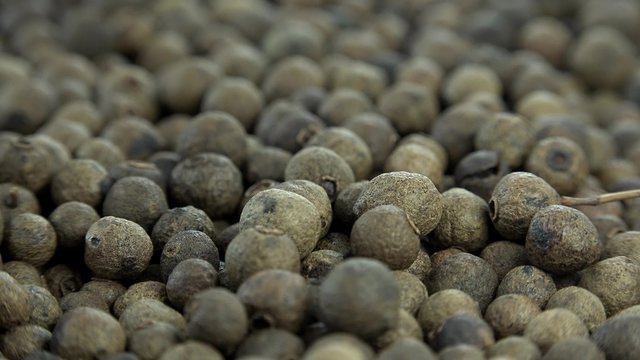 Some fresh made Allspice (rotating 4K footage; seamless loopable)