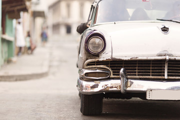 Front of old car on street of Havana, Cuba