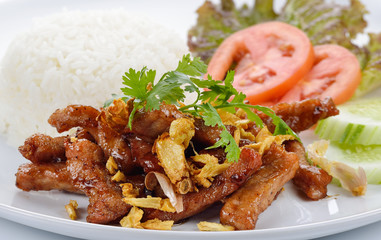 Thai style food, pork fried with crunchy garlic