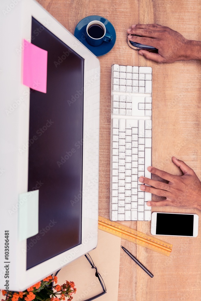Poster High angle view of businessman working on computer