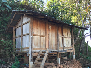 Old wooden barn of Thai hill tribe people on the mountain, Chiang Rai