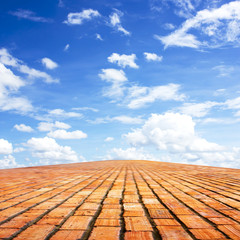 brick way on blue sky background