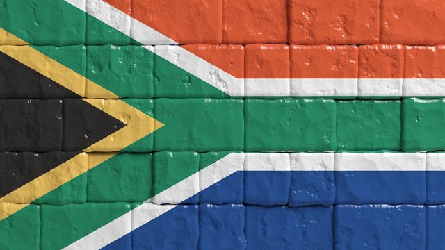 Brick Wall With Painted Flag Of South Africa