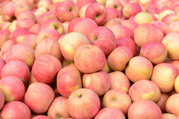 Many fresh apple stacked together