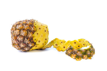 Peel off pineapple on white background