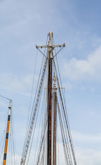 Obraz premium Masts Against Sky