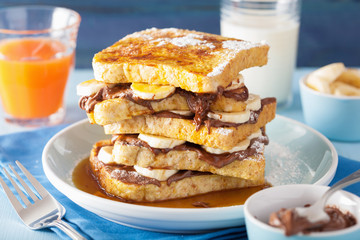 french toasts with banana chocolate sauce and caramel for breakf