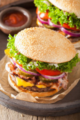 bacon cheese burger with pickles tomato onion