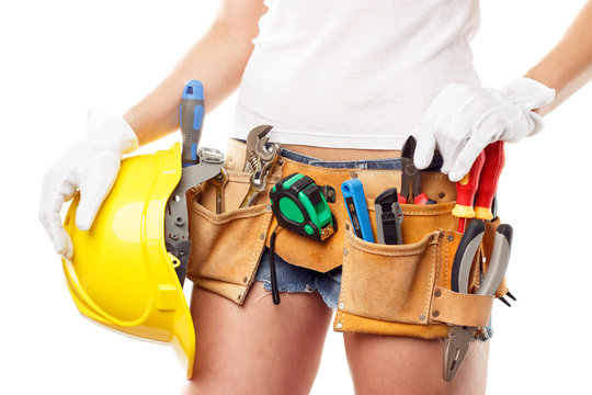 Woman builder with set of construction tools, isolated