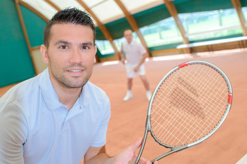 Man playing tennis