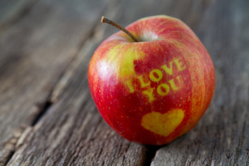 apple with heart and text 'i love you'