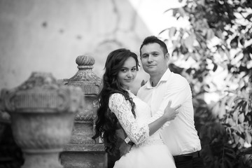 stylish gorgeous happy brunette bride  and elegant groom on the