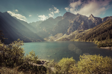 Green water mountain lake Morskie Oko, Tatra Mountains, Poland © Curioso.Photography