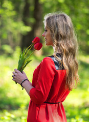 Beautiful woman and tulips