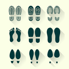 Set of footprints and shoes in a flat design