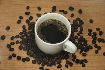   Coffee cup  on a wooden frool