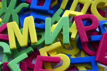 word peace written by Cyrillic letters on a multicolored background
