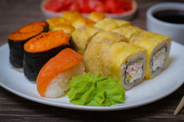 Japanese food seafood sushi , roll and chopstick on a white plate