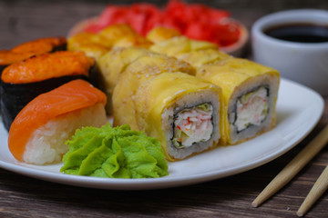 Japanese food seafood sushi , roll and chopstick on a white plate
