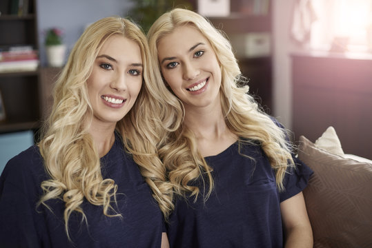 Portrait of two beautiful blonde sisters