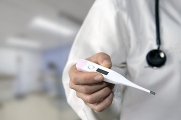 Doctor holding thermometer, Healthcare And Medicine