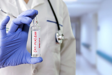 Tests For Research Of Zica virus (ZIKV), Doctor holding a vial o