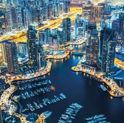 Poster Dubai Marina skyline by night with lluminated architecture. United Arab Emirates. © Funny Studio