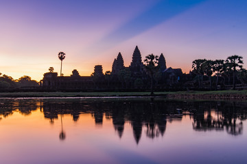 Fototapeta na wymiar Sunrise in Angkor Wat, a temple complex in Cambodia. UNESCO World Heritage Site.