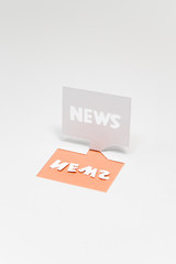 ニュース（NEWS）のイメージ（ピンク色・文字入り）