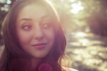 portrait of beautiful girl close-up with sunlight