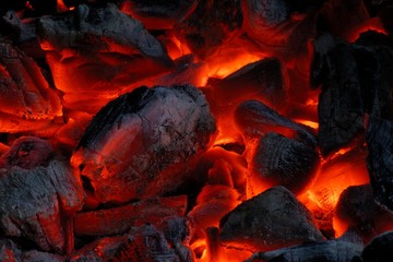 Hot coals in the campfire.