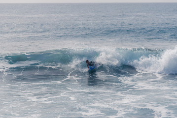 Bodyboarding and surfing in the waves of the Atlantic in front of the island La Gomera. A short...
