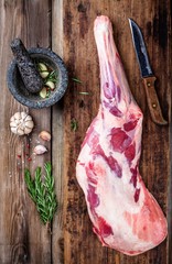 raw whole leg of lamb with spices